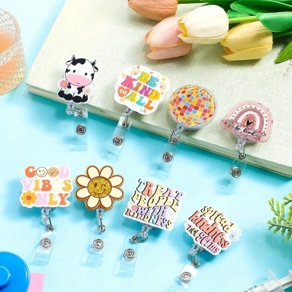Cute nurse badge reels with daisy, smile, and rainbow designs. Perfect for nurses, students, and teachers.